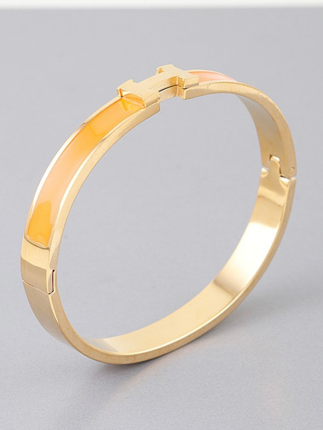 Gold H Bracelet